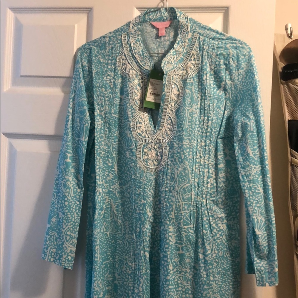 Brand new, never worn. Tags still attached